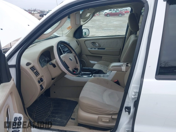2006 Mercury Mariner Luxury z VIN 4M2YU56146KJ00694, wystawiony jako IAAI lot #41619059 z przebiegiem 181 425 mil mil oraz . Historia ofert i sprzedaży dostępna na DreamBid. Obrazek 5.
