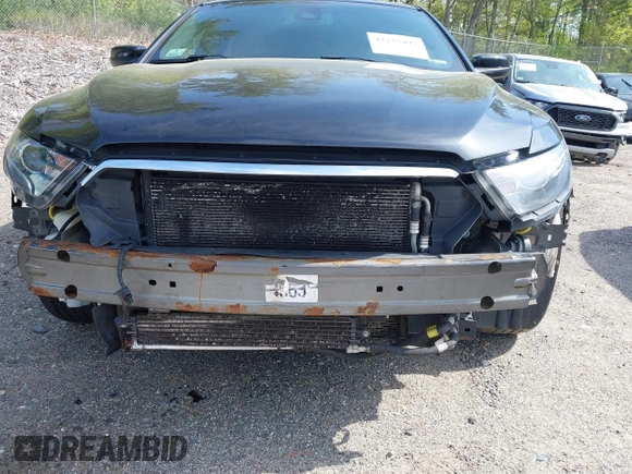 2015 Ford Taurus SHO with VIN 1FAHP2KT6FG179264, listed as a IAAI auction lot 42255497 with 103,469 mi miles and . Bid and sale history available at DreamBid. Image 6.