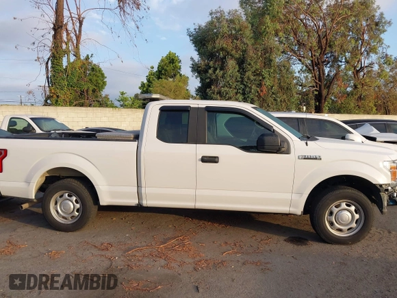 2018 Ford F-150 XL z VIN 1FTEX1CBXJFE23719, wystawiony jako IAAI lot #42606957 z przebiegiem 135 354 mil mil oraz . Historia ofert i sprzedaży dostępna na DreamBid. Obrazek 14.