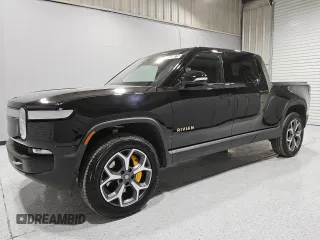 2022 Rivian R1T Adventure Package with VIN 7FCTGAAA5NN007486, listed as a Copart auction lot 52649075 with 23,292 mi miles and Clean Title. Bid and sale history available at carsss.com. Image 1.