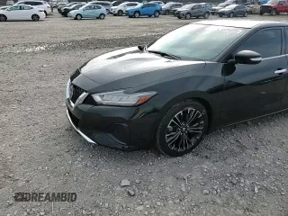 2021 Nissan Maxima SV z VIN 1N4AA6CV5MC514402, wystawiony jako Copart lot #56296955 z przebiegiem 59 428 mil mil oraz Szkoda całkowita • Salvage title. Historia ofert i sprzedaży dostępna na DreamBid. Obrazek 14.