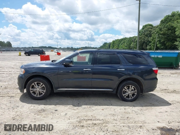 2013 Dodge Durango Crew with VIN 1C4RDHDG7DC657898, listed as a IAAI auction lot 42522353 with 234,483 mi miles and . Bid and sale history available at DreamBid. Image 14.