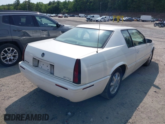 2000 Cadillac Eldorado Touring ETC z VIN 1G6ET129XYU162451, wystawiony jako IAAI lot #42412406 z przebiegiem 89 413 mil mil oraz . Historia ofert i sprzedaży dostępna na DreamBid. Obrazek 4.