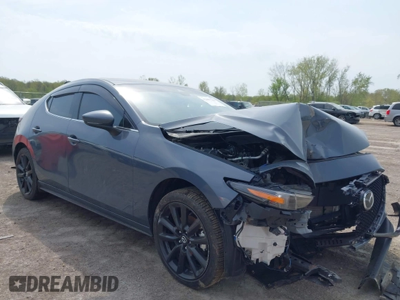 2020 Mazda 3 Premium with VIN JM1BPBNM3L1171285, listed as a IAAI auction lot 42097340 with 50,799 mi miles and . Bid and sale history available at DreamBid. Image 1.