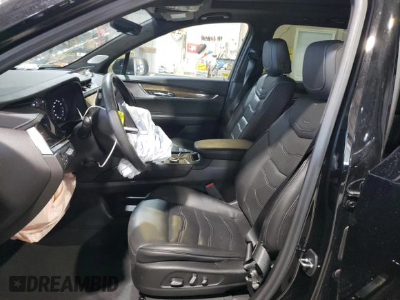 2023 Cadillac XT6 AWD Premium Luxury with VIN 1GYKPFRS3PZ121942, listed as a Copart auction lot 46489545 with 35,453 mi miles and Salvage Title. Bid and sale history available at DreamBid. Image 7.