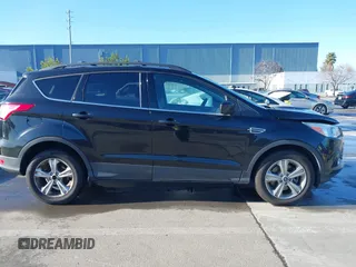 2013 Ford Escape SE with VIN 1FMCU9G98DUD88521, listed as a IAAI auction lot 41496428 with 163,321 mi miles and . Bid and sale history available at DreamBid. Image 13.