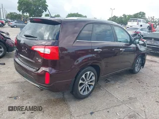 2014 Kia Sorento SX z VIN 5XYKW4A77EG548993, wystawiony jako IAAI lot #42392086 z przebiegiem 29 671 mil mil oraz . Historia ofert i sprzedaży dostępna na DreamBid. Obrazek 4.
