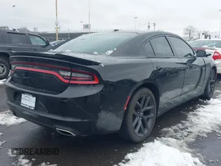 2022 Dodge Charger SXT with VIN 2C3CDXBG0NH157720, listed as a IAAI auction lot 41559731 with 21,062 mi miles and . Bid and sale history available at carsss.com. Image 4.
