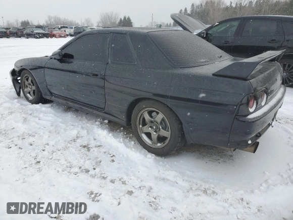 1991 Nissan Skyline z VIN BNR32016641, wystawiony jako Copart lot #87935775 z przebiegiem 166 776 mil mil oraz Szkoda całkowita • Salvage title. Historia ofert i sprzedaży dostępna na DreamBid. Obrazek 2.