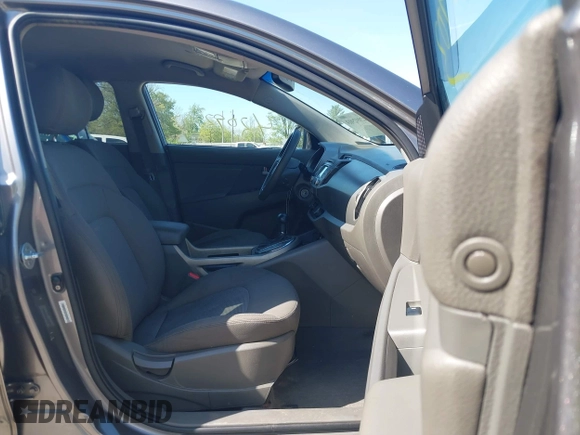 2014 Kia Sportage LX with VIN KNDPBCAC3E7587943, listed as a IAAI auction lot 42092903 with 153,483 mi miles and . Bid and sale history available at carsss.com. Image 5.
