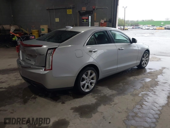 2016 Cadillac ATS Standard AWD z VIN 1G6AG5RX6G0149829, wystawiony jako IAAI lot #42165534 z przebiegiem 40 996 mil mil oraz . Historia ofert i sprzedaży dostępna na DreamBid. Obrazek 4.