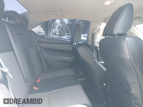 2017 Toyota Corolla L with VIN 5YFBURHE3HP610414, listed as a IAAI auction lot 42410369 with 157,908 mi miles and . Bid and sale history available at DreamBid. Image 8.