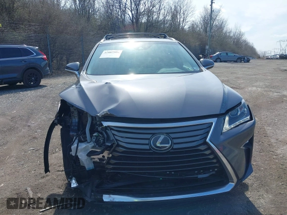 2019 Lexus RX with VIN 2T2BGMCA9KC033678, listed as a IAAI auction lot 41887500 with 42,382 mi miles. Bid and sale history available at carsss.com. Image 13.