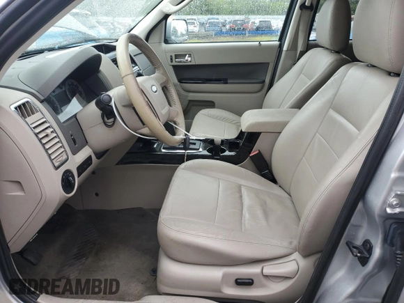 2009 Ford Escape Hybrid with VIN 1FMCU593X9KB92939, listed as a Copart auction lot 57641855 with 168,597 mi miles and Salvage title. Bid and sale history available at DreamBid. Image 7.