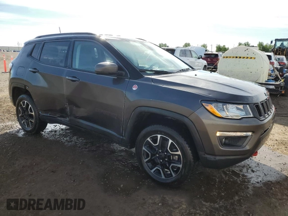 2021 Jeep Compass Trailhawk with VIN 3C4NJDDB7MT533137, listed as a Copart auction lot 56938215 with 92,507 mi miles and Salvage title. Bid and sale history available at DreamBid. Image 4.