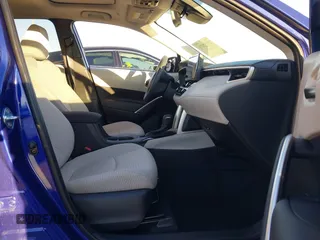 2024 Toyota Corolla Cross LE with VIN 7MUBAABG4RV092431, listed as a IAAI auction lot 41012071 with 4,641 mi miles and . Bid and sale history available at DreamBid. Image 5.