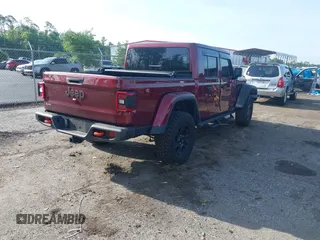 2021 Jeep Gladiator Mojave with VIN 1C6JJTEG8ML592381, listed as a IAAI auction lot 42369581 with 75,295 mi miles and . Bid and sale history available at DreamBid. Image 4.