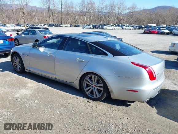 2014 Jaguar XJ z VIN SAJWJ1CD0E8V63989, wystawiony jako IAAI lot #41643513 z przebiegiem 119 924 mil mil oraz . Historia ofert i sprzedaży dostępna na DreamBid. Obrazek 3.