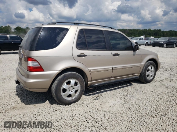 2002 Mercedes-Benz M-Class with VIN 4JGAB54E72A322046, listed as a Copart auction lot 74393084 with 128,015 mi miles and Salvage Title. Bid and sale history available at carsss.com. Image 3.