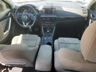 2014 Mazda CX-5 Touring z VIN JM3KE2CYXE0327950, wystawiony jako Copart lot #51390585 z przebiegiem 129 523 mil mil oraz Czysty tytuł • Clean title. Historia ofert i sprzedaży dostępna na DreamBid. Obrazek 8.