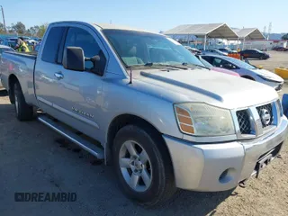 2006 Nissan Titan SE with VIN 1N6AA06A46N537254, listed as a IAAI auction lot 41841854 with 211,775 mi miles and . Bid and sale history available at DreamBid. Image 1.