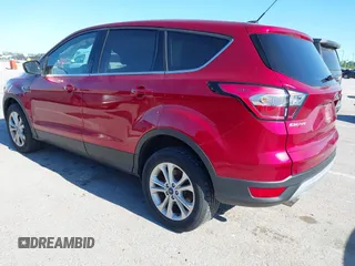 2017 Ford Escape SE z VIN 1FMCU9G9XHUE08239, wystawiony jako IAAI lot #42326698 z przebiegiem 96 471 mil mil oraz . Historia ofert i sprzedaży dostępna na DreamBid. Obrazek 3.