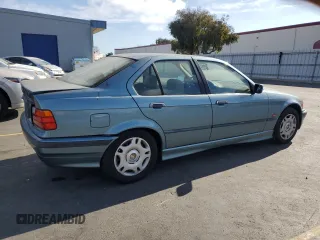 1998 BMW 3 Series 318i with VIN WBACC9322WEE60455, listed as a Copart auction lot 75950324 with 328,714 mi miles and Salvage Title. Bid and sale history available at carsss.com. Image 3.