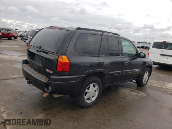 2003 GMC Envoy SLE with VIN 1GKDS13S632226264, listed as a Copart auction lot 82461694 with Not Provided miles and Clean Title. Bid and sale history available at carsss.com. Image 3.