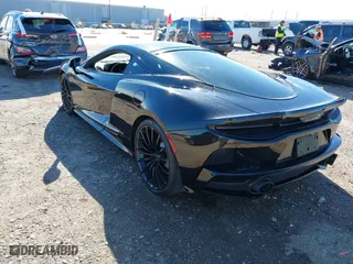 2020 McLaren GT with VIN SBM22GCA1LW000498, listed as a IAAI auction lot 41265247 with 18,465 mi miles. Bid and sale history available at carsss.com. Image 3.