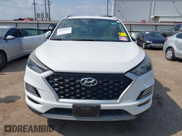 2019 Hyundai Tucson Sport with VIN KM8J33AL1KU861698, listed as a IAAI auction lot 42129173 with 100,160 mi miles. Bid and sale history available at carsss.com. Image 12.