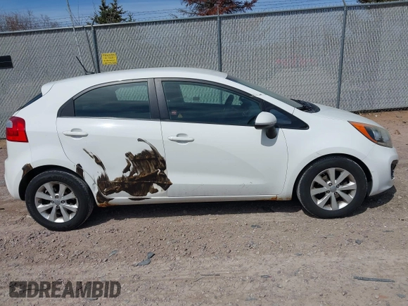 2012 Kia Rio EX with VIN KNADN5A37C6031494, listed as a IAAI auction lot 42052186 with 141,765 mi miles. Bid and sale history available at carsss.com. Image 13.