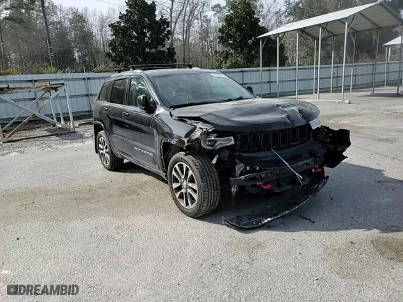 2017 Jeep Grand Cherokee Overland with VIN 1C4RJECG3HC723653, listed as a Copart auction lot 47365725 with 63,827 mi miles and Salvage Title. Bid and sale history available at carsss.com. Image 12.