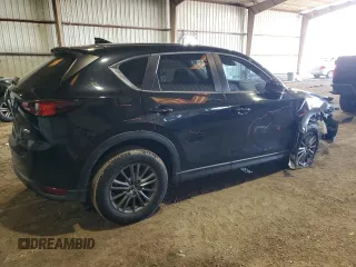 2017 Mazda CX-5 Sport with VIN JM3KFABL9H0210264, listed as a Copart auction lot 87918795 with 129,827 mi miles and Salvage Title. Bid and sale history available at carsss.com. Image 3.