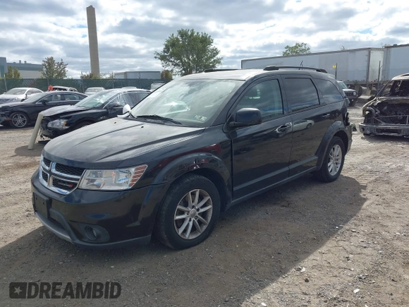 2013 Dodge Journey SXT with VIN 3C4PDDBG7DT553130, listed as a IAAI auction lot 40570369 with Not Provided miles and . Bid and sale history available at DreamBid. Image 2.