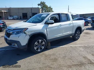 2017 Honda Ridgeline RTL-E with VIN 5FPYK3F7XHB011188, listed as a IAAI auction lot 41766257 with 90,020 mi miles. Bid and sale history available at carsss.com. Image 2.