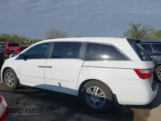 2012 Honda Odyssey EX-L with VIN 5FNRL5H62CB010054, listed as a IAAI auction lot 42040117 with 189,566 mi miles and . Bid and sale history available at carsss.com. Image 15.
