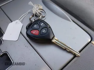 2007 Toyota Camry CE z VIN 4T1BE46K97U714024, wystawiony jako IAAI lot #42416410 z przebiegiem 218 500 mil mil oraz . Historia ofert i sprzedaży dostępna na DreamBid. Obrazek 11.
