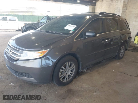 2012 Honda Odyssey EX-L with VIN 5FNRL5H67CB016934, listed as a IAAI auction lot 42405714 with 248,512 mi miles and . Bid and sale history available at DreamBid. Image 17.
