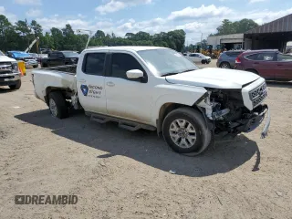 2023 Nissan Frontier SV with VIN 1N6ED1FK1PN659143, listed as a Copart auction lot 60690044 with 13,706 mi miles and Salvage Title. Bid and sale history available at carsss.com. Image 4.