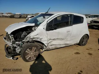 2014 Chevrolet Spark LS with VIN KL8CB6S95EC519601, listed as a Copart auction lot 46954735 with 0 mi miles and Salvage Title. Bid and sale history available at carsss.com. Image 1.