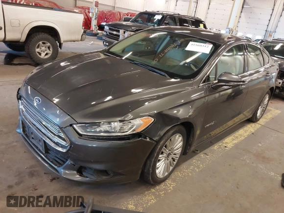 2016 Ford Fusion SE Hybrid with VIN 3FA6P0LU9GR235291, listed as a IAAI auction lot 41560312 with 112,777 mi miles. Bid and sale history available at carsss.com. Image 2.