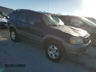2002 Mazda Tribute LX with VIN 4F2YU09172KM62596, listed as a Copart auction lot 76912034 with 225,892 mi miles and Salvage Title. Bid and sale history available at carsss.com. Image 7.