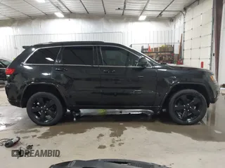 2015 Jeep Grand Cherokee Laredo with VIN 1C4RJFAG3FC115444, listed as a IAAI auction lot 41248211 with 138,828 mi miles. Bid and sale history available at carsss.com. Image 14.
