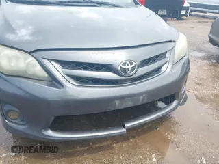 2011 Toyota Corolla L with VIN 2T1BU4EE6BC679516, listed as a IAAI auction lot 42104879 with 184,014 mi miles. Bid and sale history available at carsss.com. Image 6.