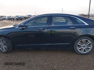 2014 Lincoln MKZ with VIN 3LN6L2G90ER801385, listed as a IAAI auction lot 41815173 with 155,579 mi miles and . Bid and sale history available at DreamBid. Image 13.
