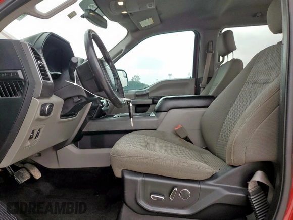 2018 Ford F-150 XL with VIN 1FTEW1CP5JKD16597, listed as a Copart auction lot 57623125 with 122,292 mi miles and Salvage title. Bid and sale history available at DreamBid. Image 7.