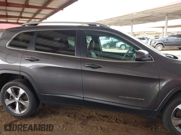 2021 Jeep Cherokee Limited with VIN 1C4PJLDX2MD187065, listed as a IAAI auction lot 41729812 with 71,470 mi miles and . Bid and sale history available at DreamBid. Image 13.