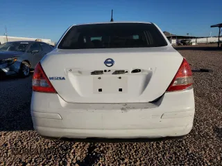 2010 Nissan Versa 1.6 with VIN 3N1CC1AP0AL468324, listed as a Copart auction lot 80086414 with 183,422 mi miles and Salvage Title. Bid and sale history available at carsss.com. Image 6.