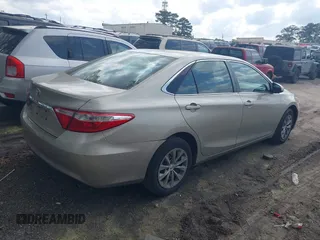 2015 Toyota Camry XLE z VIN 4T1BF1FK6FU485215, wystawiony jako IAAI lot #41938932 z przebiegiem 123 401 mil mil oraz . Historia ofert i sprzedaży dostępna na DreamBid. Obrazek 4.