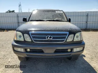 2004 Lexus LX 470 z VIN JTJHT00W843539918, wystawiony jako Copart lot #60612045 z przebiegiem 303 070 mil mil oraz Czysty tytuł • Clean title. Historia ofert i sprzedaży dostępna na DreamBid. Obrazek 5.